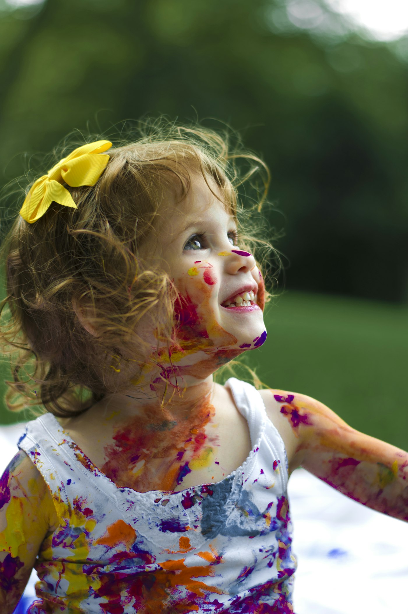 A young child painting